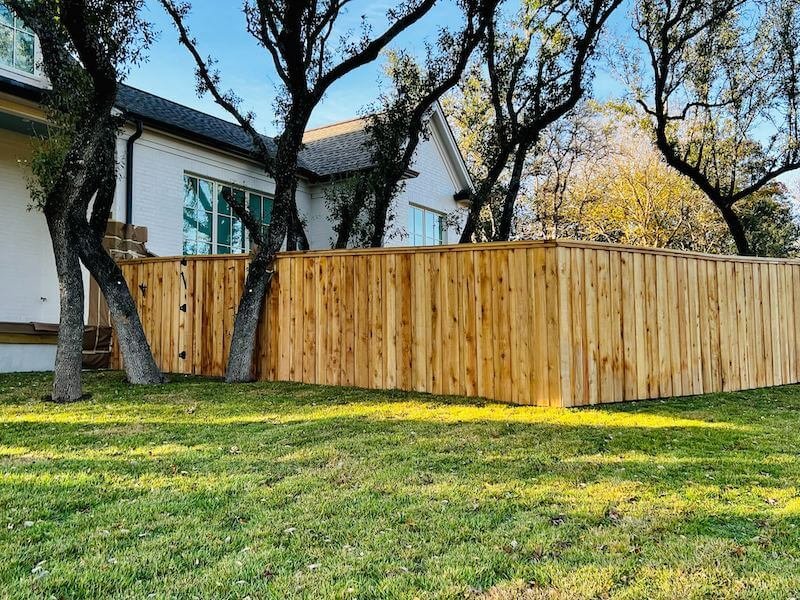 New wood privacy fence installed in a Baton Rouge backyard